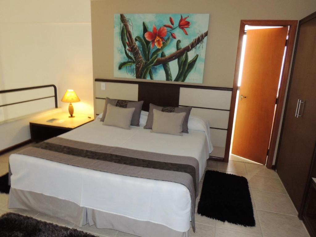 Postel nebo postele na pokoji v ubytování Mondrian Suite Hotel