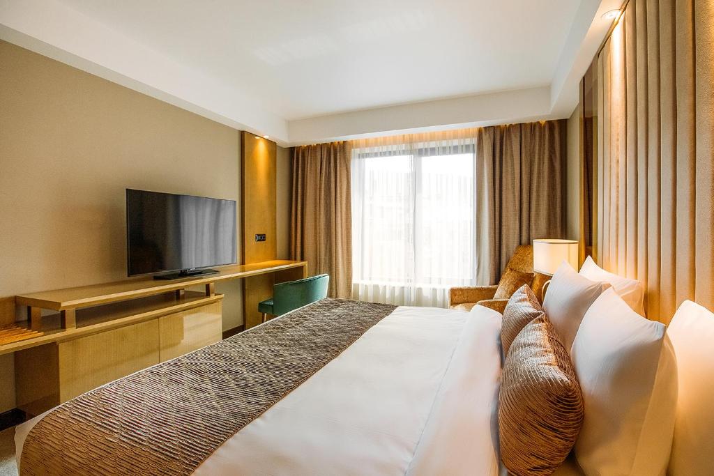 TV a/nebo společenská místnost v ubytování Marjan Plaza Hotel