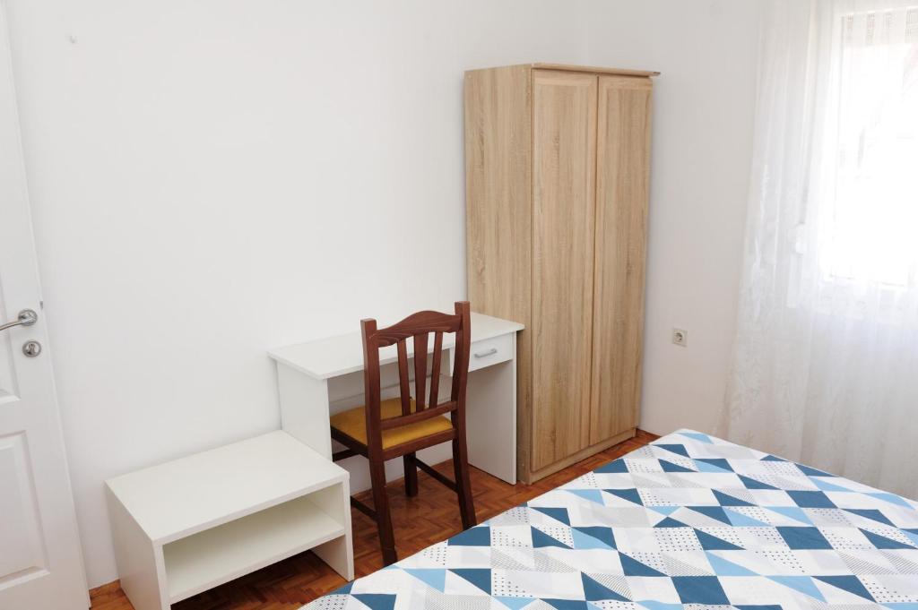 Posteľ alebo postele v izbe v ubytovaní Apartman Noa 16