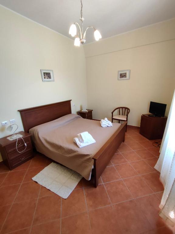 Postel nebo postele na pokoji v ubytování Casa vacanze la Morgia