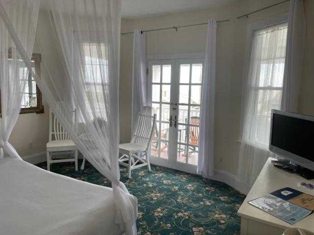 Postel nebo postele na pokoji v ubytování Hotel Macomber