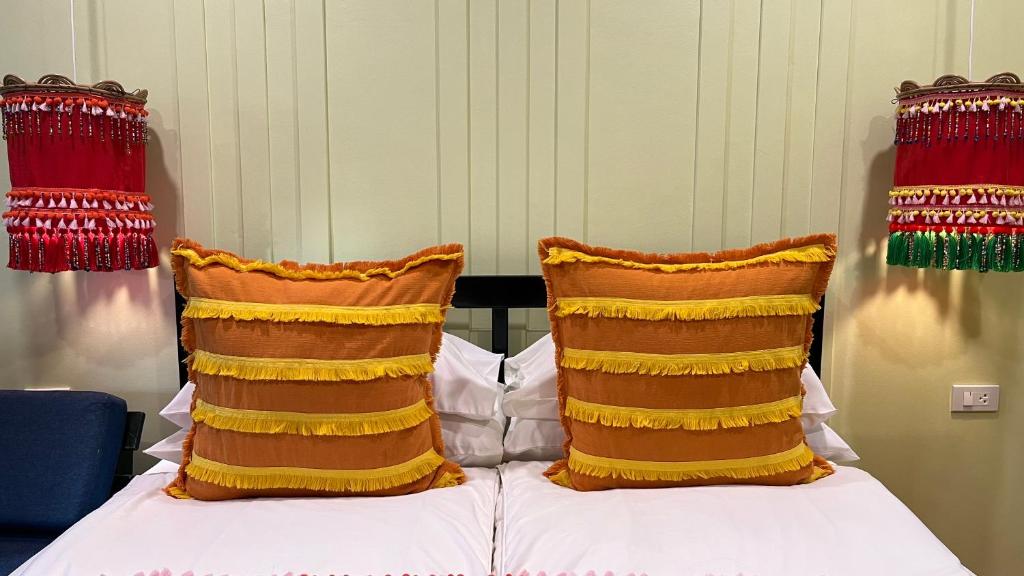 Postel nebo postele na pokoji v ubytování Baan Bua Cottage SHA EXTRA PLUS B5510