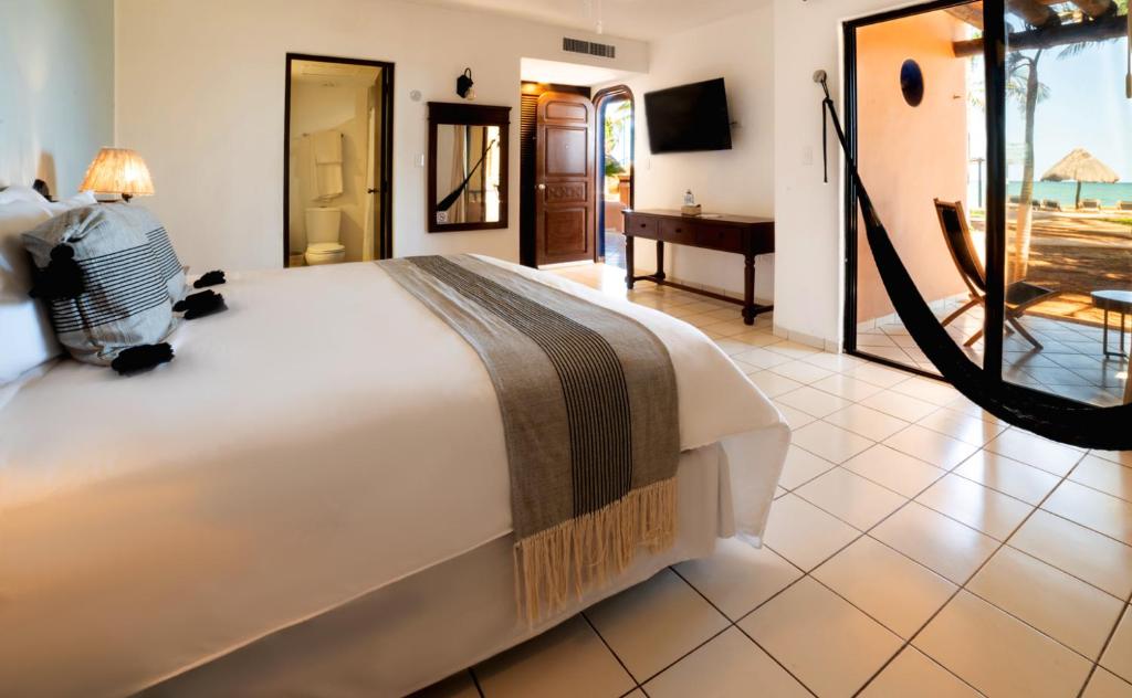 Postel nebo postele na pokoji v ubytování Reef Yucatán All Inclusive & Convention Center