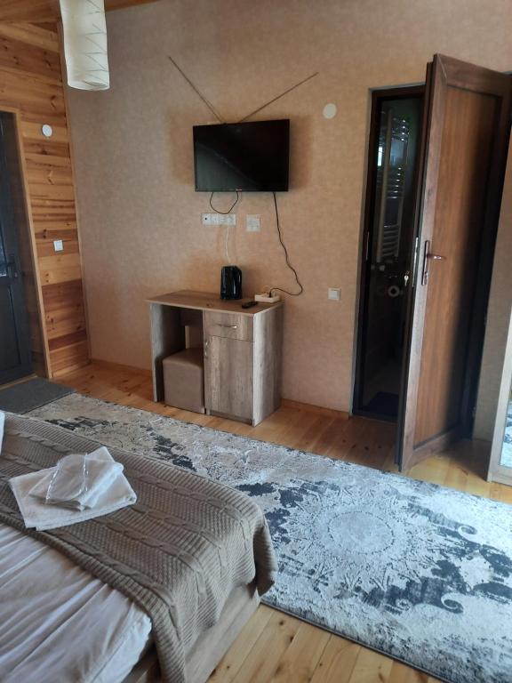 Postel nebo postele na pokoji v ubytování Four Season In Kazbegi