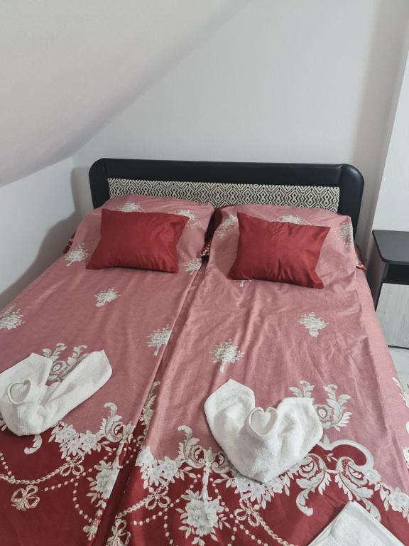 Posteľ alebo postele v izbe v ubytovaní Hobby Vendégház