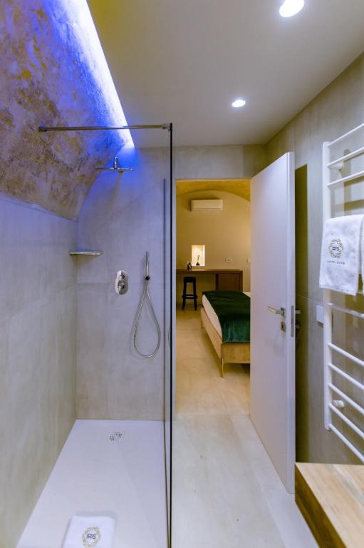 Postel nebo postele na pokoji v ubytování Iris Luxury Suite