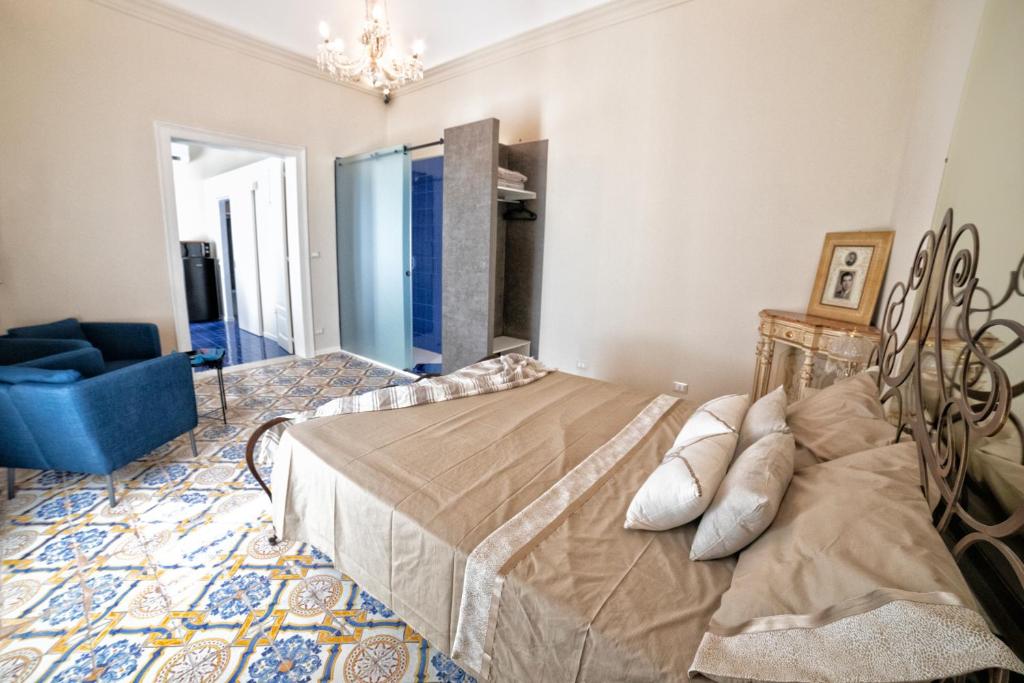 Postel nebo postele na pokoji v ubytování Cave Bianche Apartments