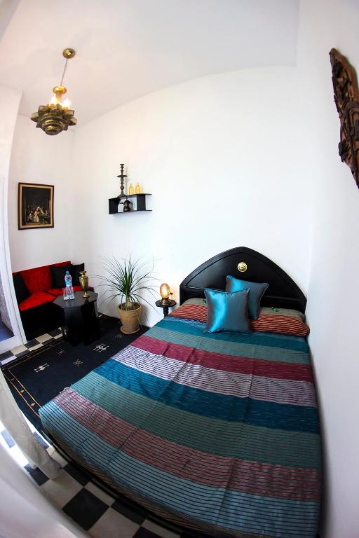 Letto o letti in una camera di Dar Nakhla Naciria