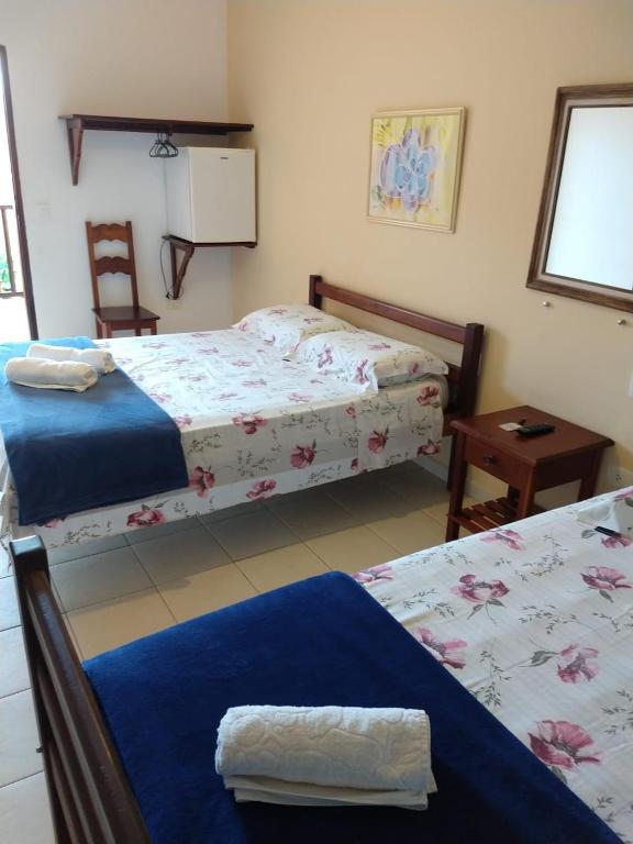 Postel nebo postele na pokoji v ubytování Pousada Astro Rei Paraty