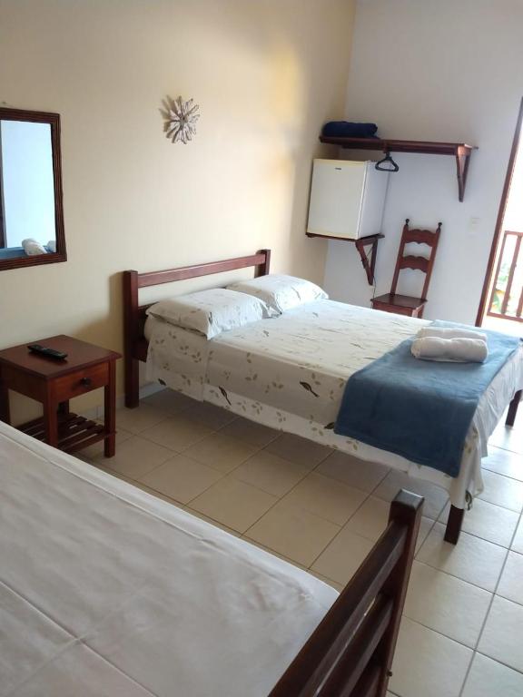 Postel nebo postele na pokoji v ubytování Pousada Astro Rei Paraty