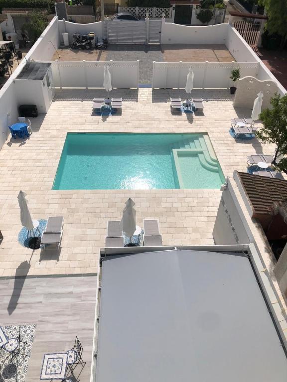 Bazén v ubytování B&B Alto Salento - Pool and Sun nebo v jeho okolí