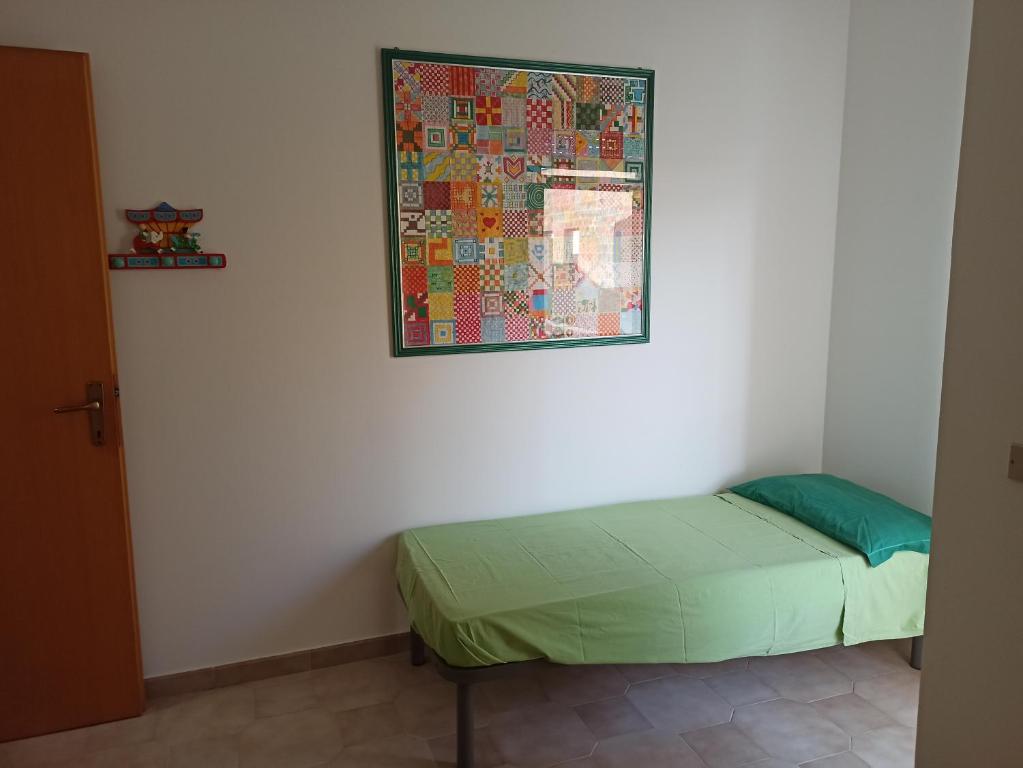 Postel nebo postele na pokoji v ubytování Casa Gialla