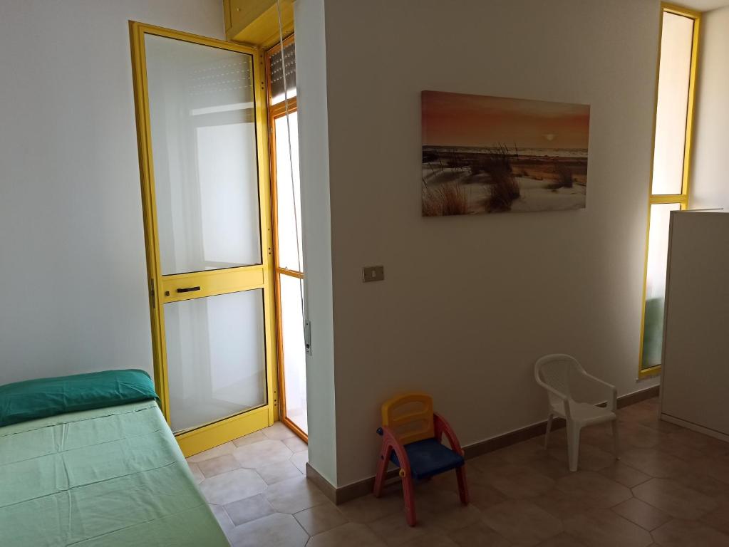 Postel nebo postele na pokoji v ubytování Casa Gialla