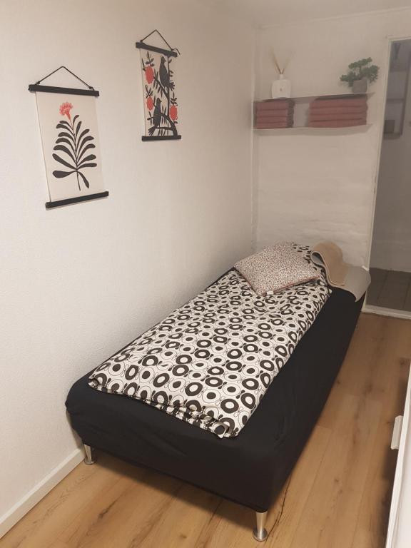 En eller flere senger på et rom på Trandafir Guesthouse