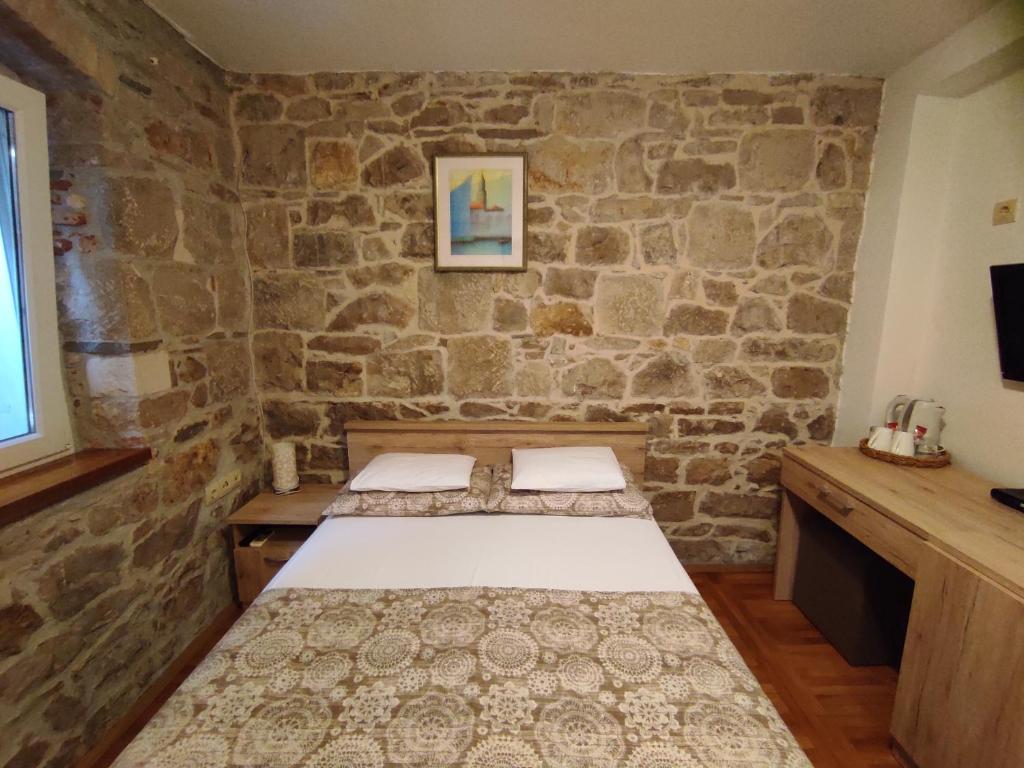 Postel nebo postele na pokoji v ubytování Guesthouse Mirula