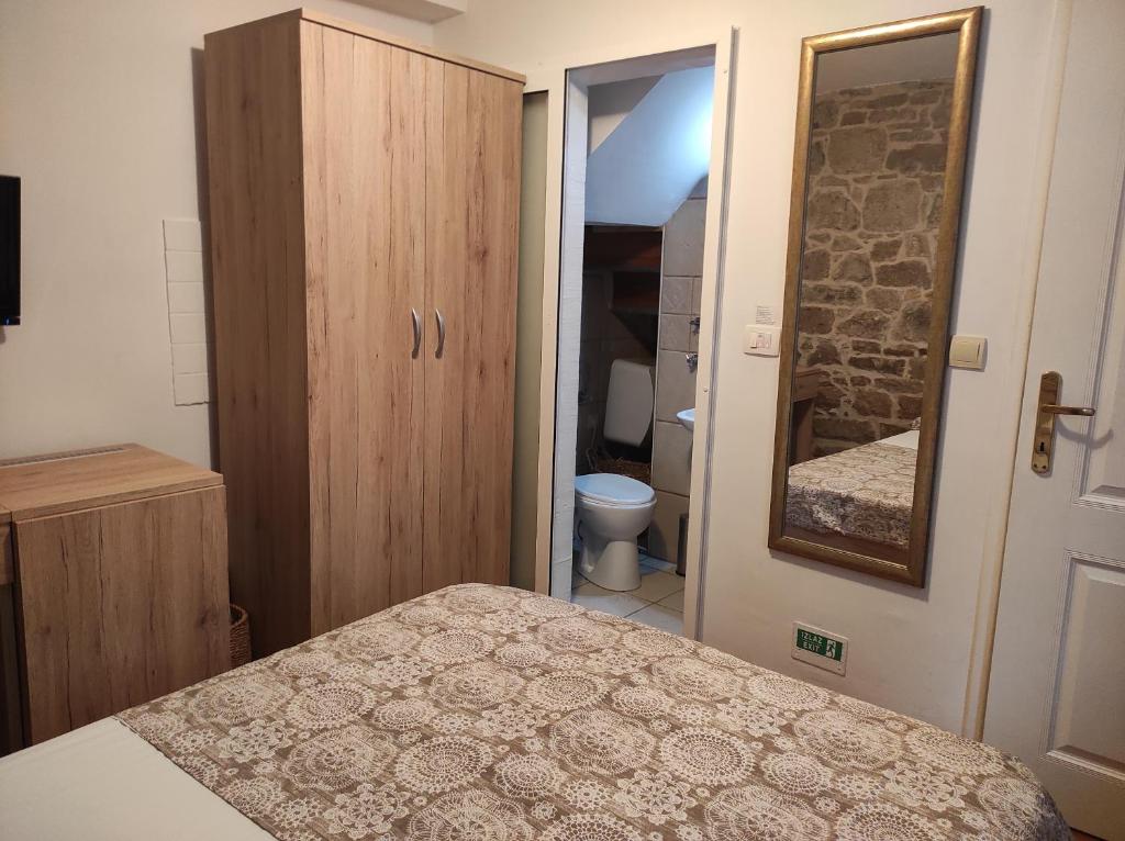 Postel nebo postele na pokoji v ubytování Guesthouse Mirula
