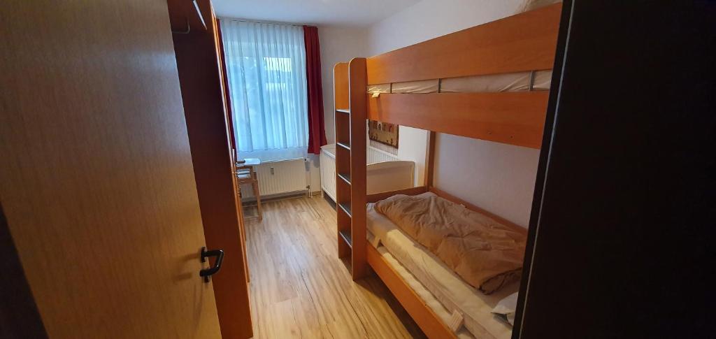 Postel nebo postele na pokoji v ubytování Ferienidyll Langeoog