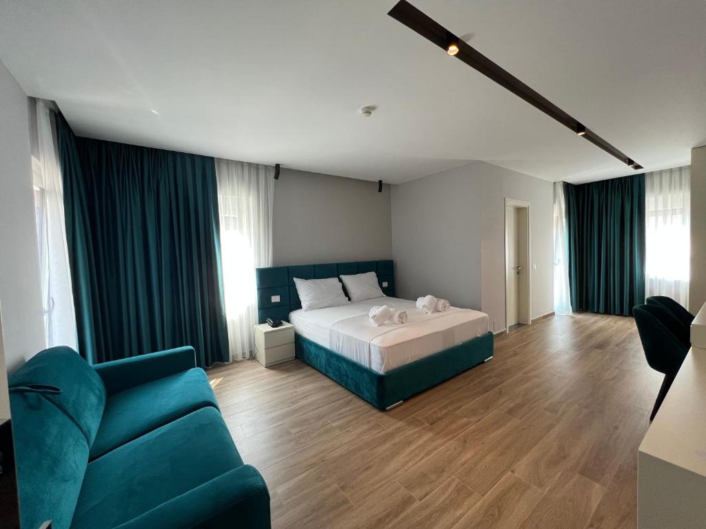 Postel nebo postele na pokoji v ubytování Hotel LEON - Beach Front