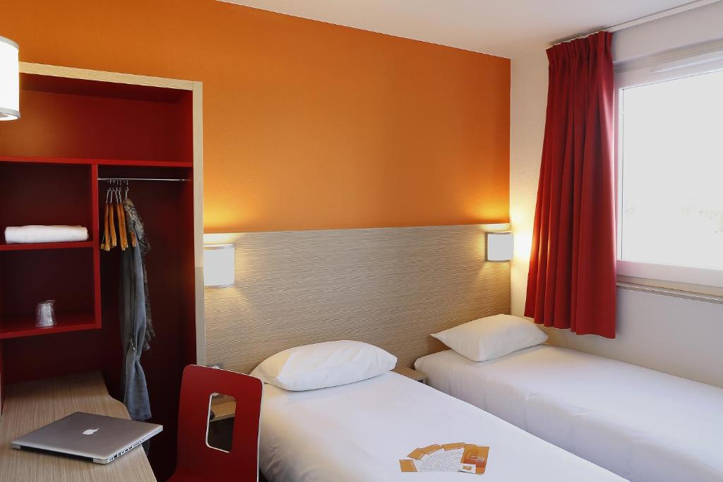 Postel nebo postele na pokoji v ubytování B&B HOTEL Gap