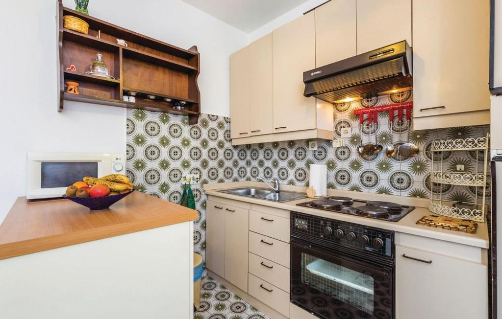 Kuchnia lub aneks kuchenny w obiekcie Apartments with a parking space Lovran, Opatija - 7673