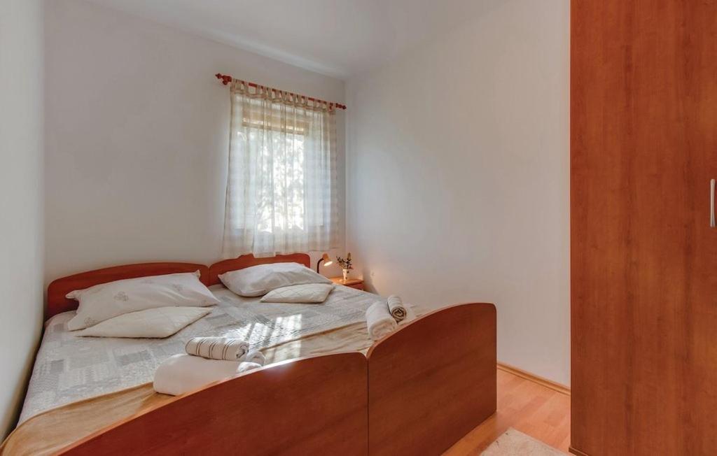 Posteľ alebo postele v izbe v ubytovaní Apartments with a parking space Nerezine, Losinj - 7961