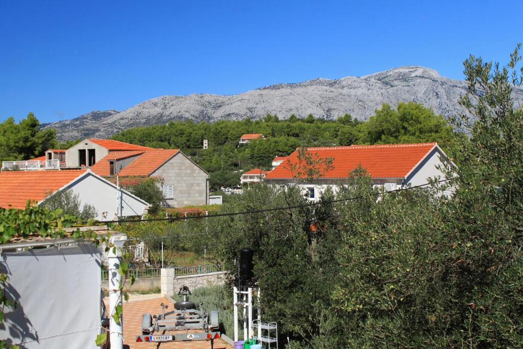Fotografia z galérie ubytovania Apartments by the sea Lumbarda, Korcula - 9302 v destinácii Lumbarda