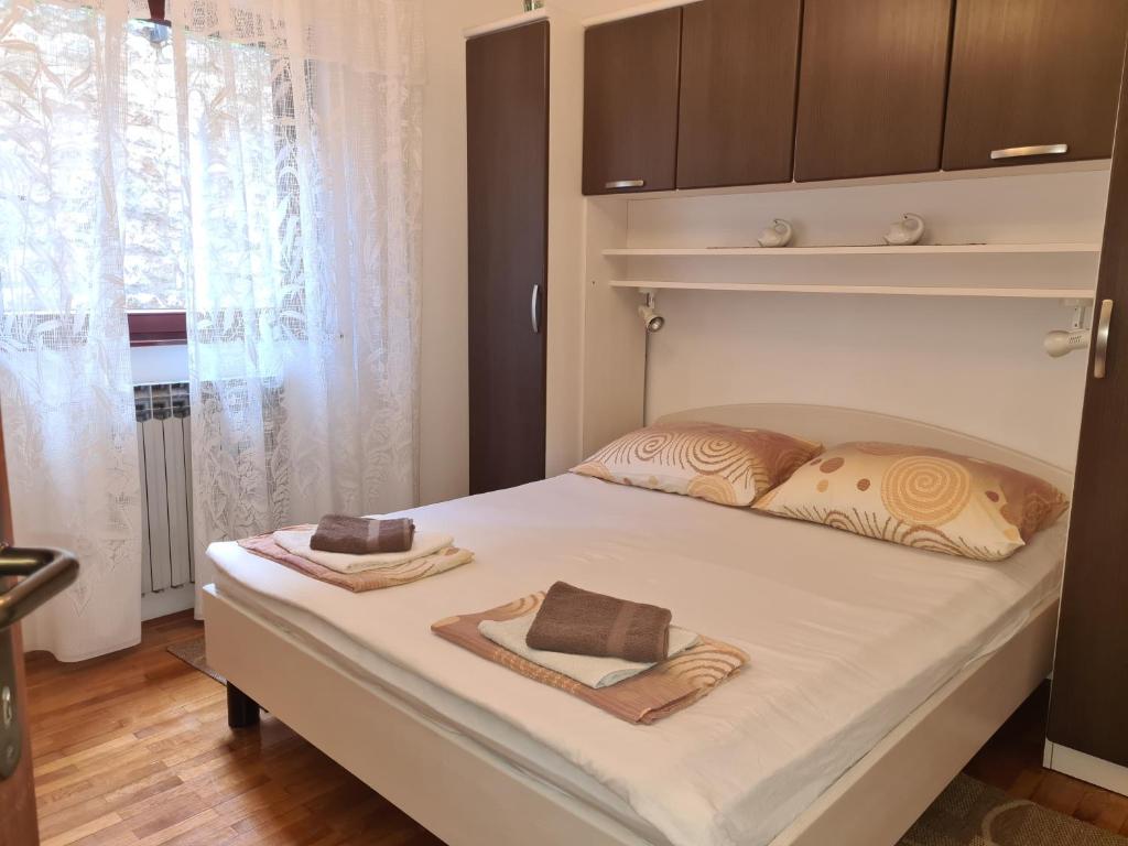 Posteľ alebo postele v izbe v ubytovaní Apartments with a parking space Moscenicka Draga, Opatija - 7746