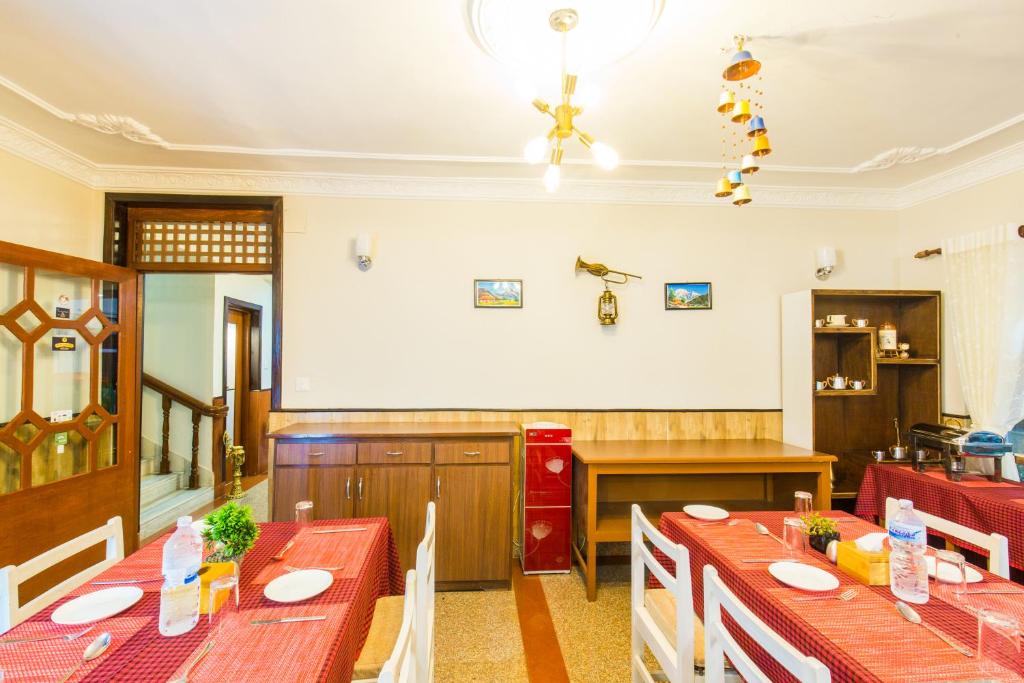 Kuchyň nebo kuchyňský kout v ubytování Hotel Acme Inn