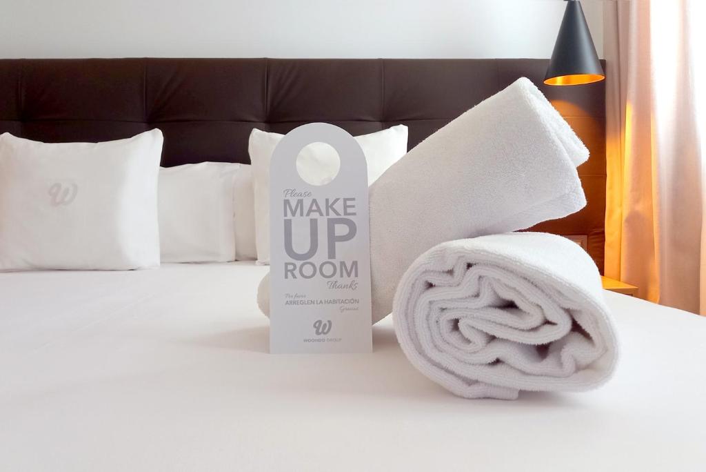 Postel nebo postele na pokoji v ubytování Woohoo Rooms Boutique Gran Vía