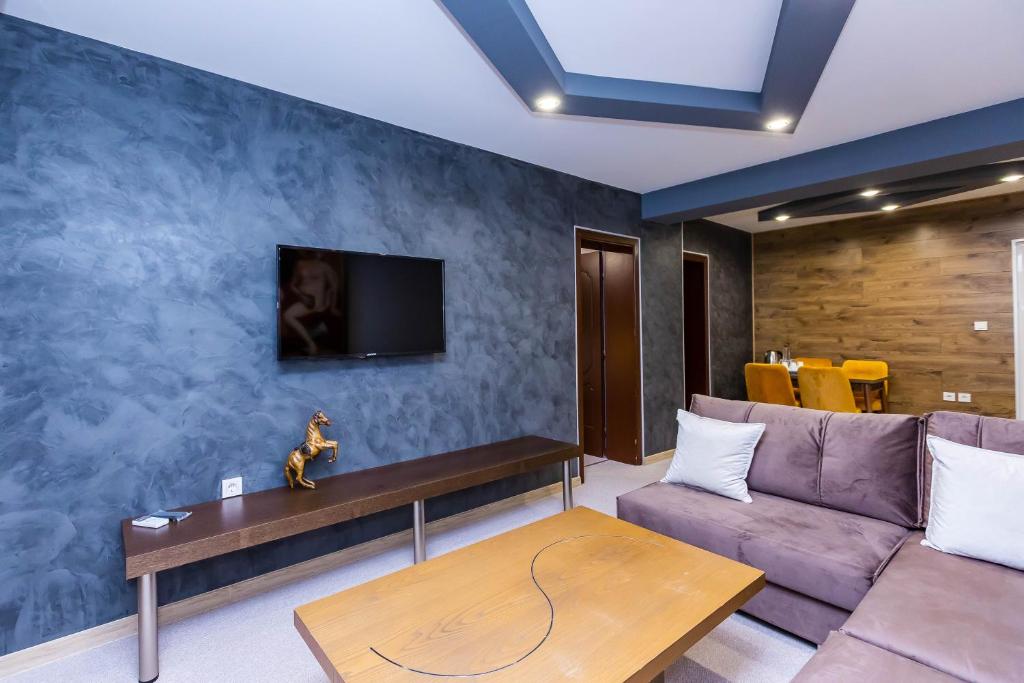 TV a/nebo společenská místnost v ubytování Komitite Complex