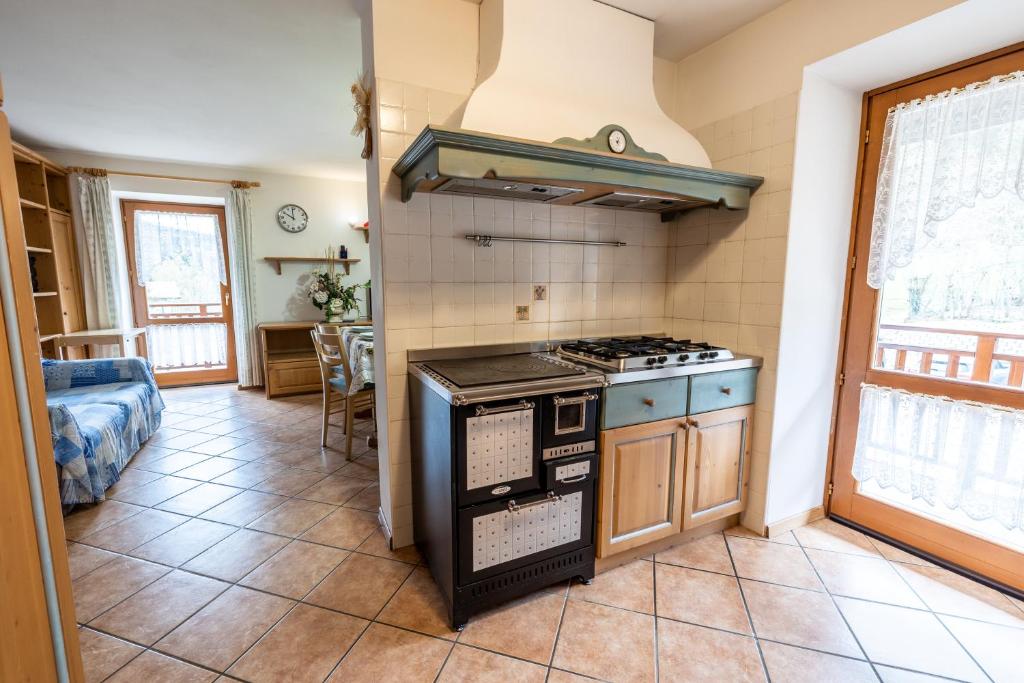 Kuchyň nebo kuchyňský kout v ubytování Casa Pergher