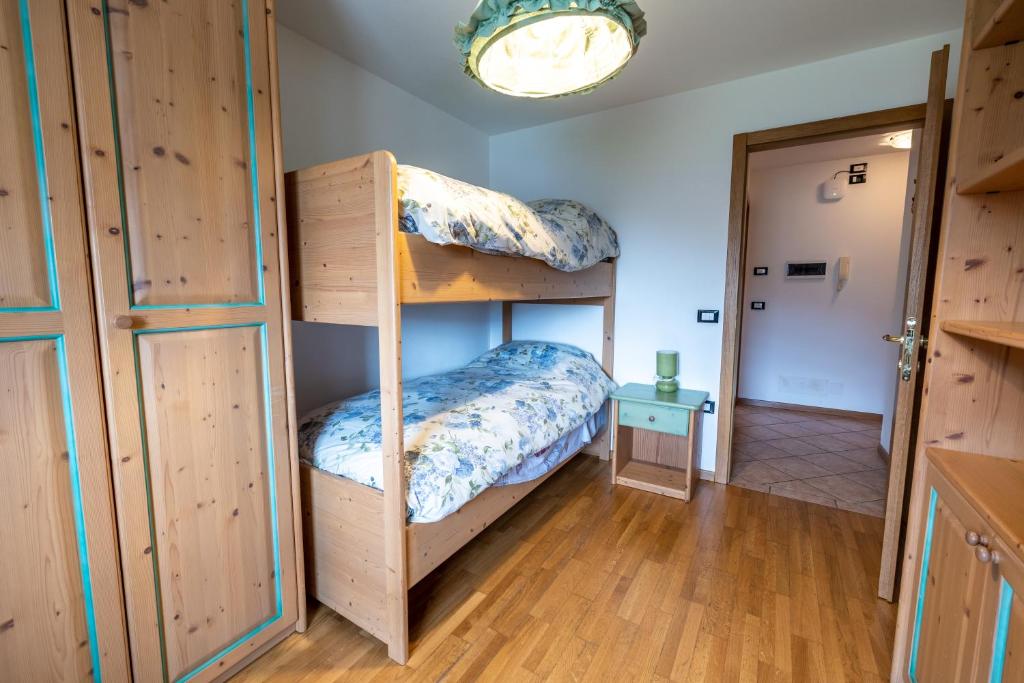 Postel nebo postele na pokoji v ubytování Casa Pergher
