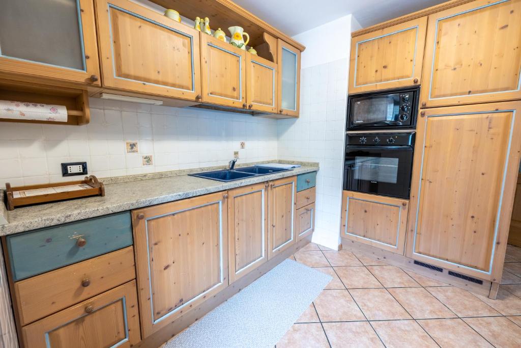 Kuchyň nebo kuchyňský kout v ubytování Casa Pergher