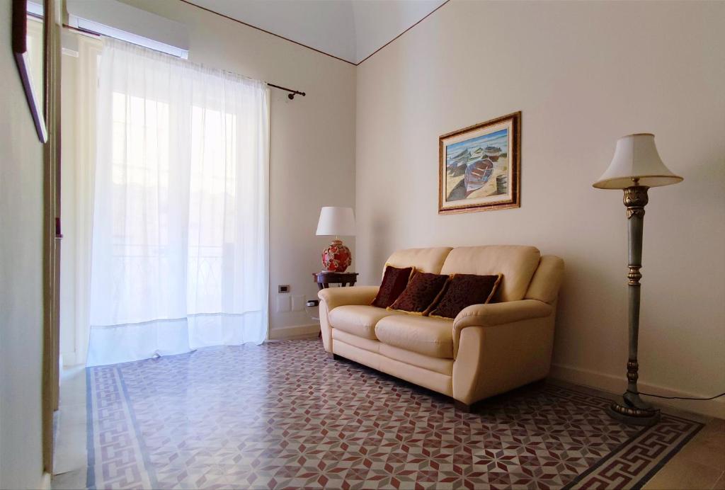 A seating area at L'infatata Suite Apartment
