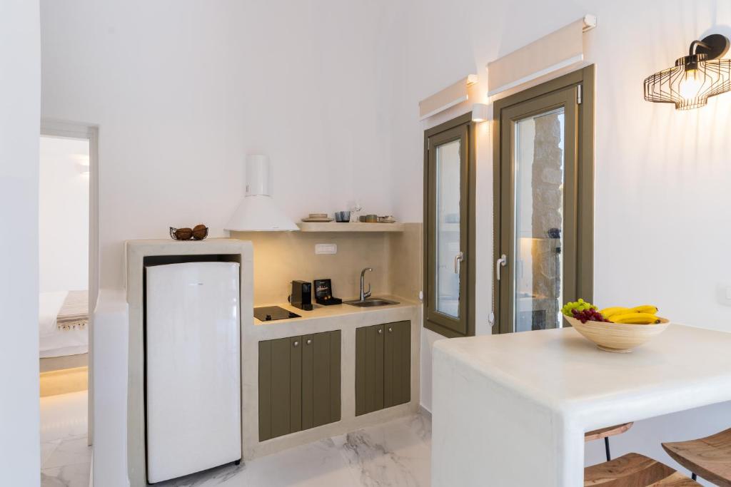 Kuchyň nebo kuchyňský kout v ubytování Lavadoze Luxury Suites