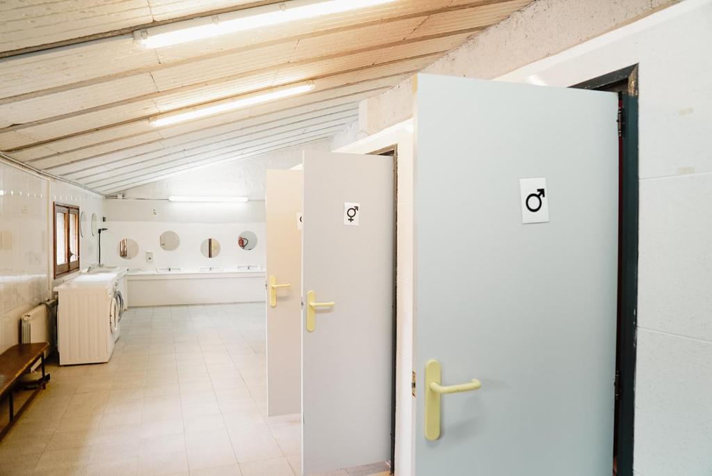 Postel nebo postele na pokoji v ubytování Cases Altes de Posada