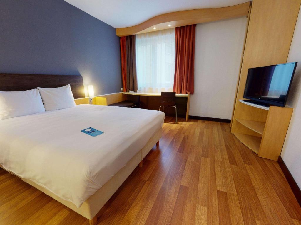 Postel nebo postele na pokoji v ubytování Ibis Bratislava Centrum