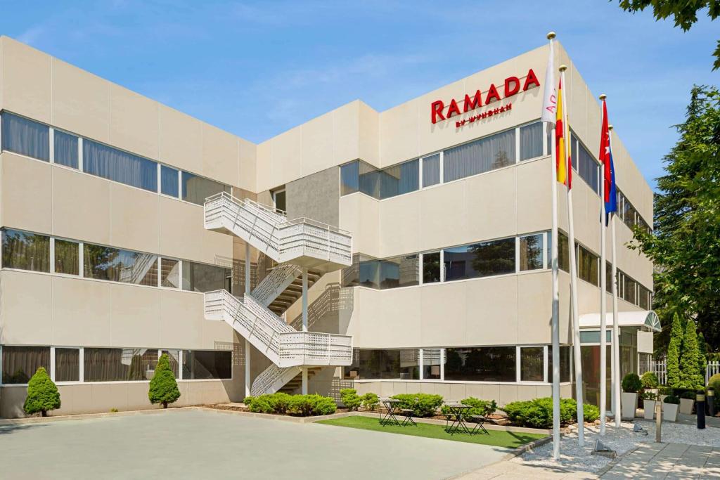 a rendering of the front of the raleigh hotel at Ramada by Wyndham Madrid Tres Cantos in Tres Cantos