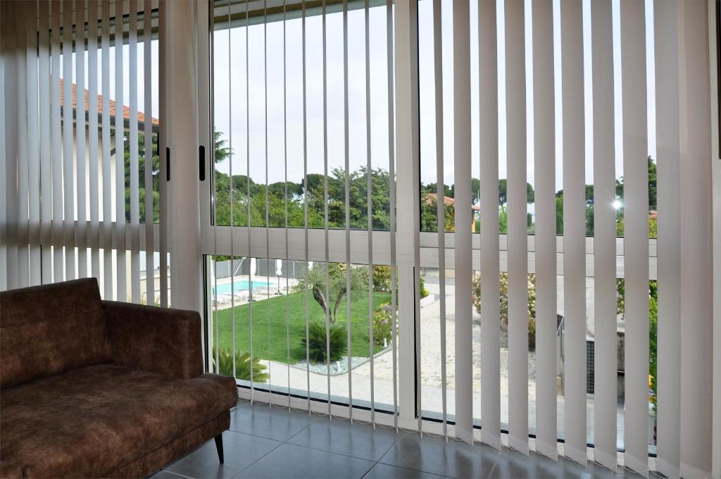 Vonkajšia záhrada v ubytovaní Garda Bloom Holiday Apartments
