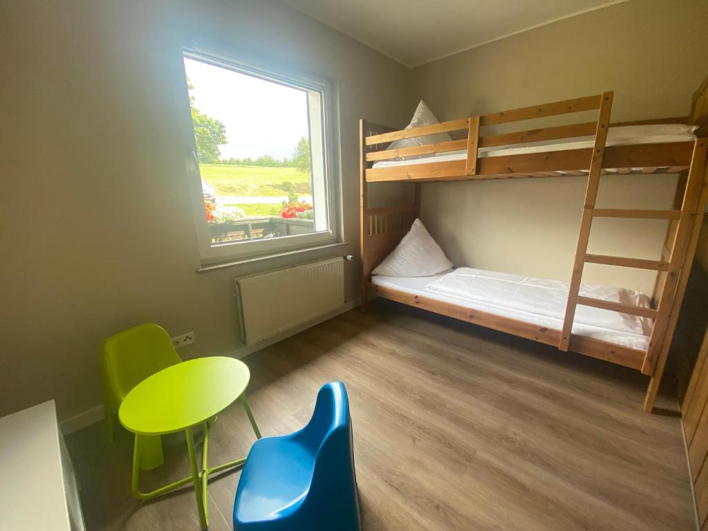 Postel nebo postele na pokoji v ubytování Berghotel Lenneplätze Winterberg