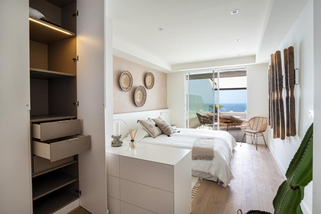 Łóżko lub łóżka w pokoju w obiekcie Infinity Horizon Apartment - Costa Blanca