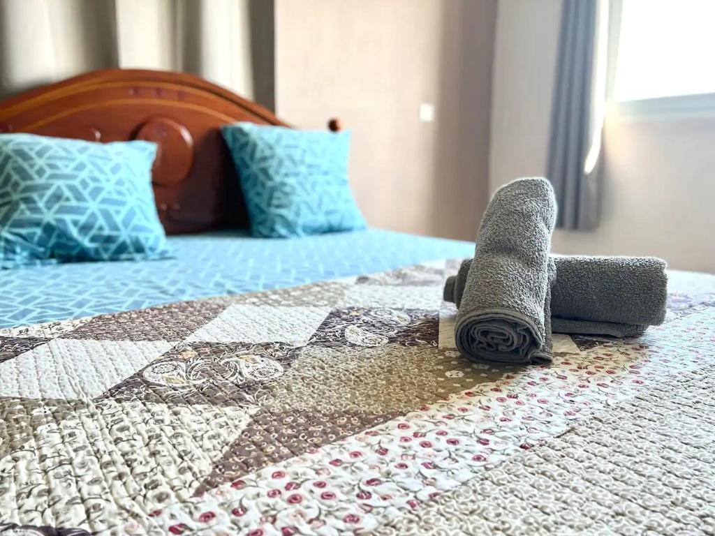 Ένα ή περισσότερα κρεβάτια σε δωμάτιο στο Superbe T2 full équipé à sada avec vue sur îlot