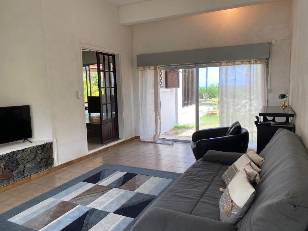 Posezení v ubytování Villa Coco des sables accès direct au lagon