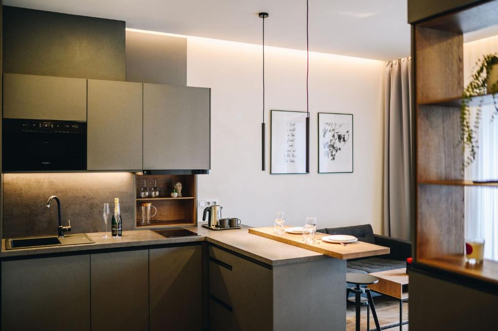 Kuchyň nebo kuchyňský kout v ubytování Executive Apartments Taborska