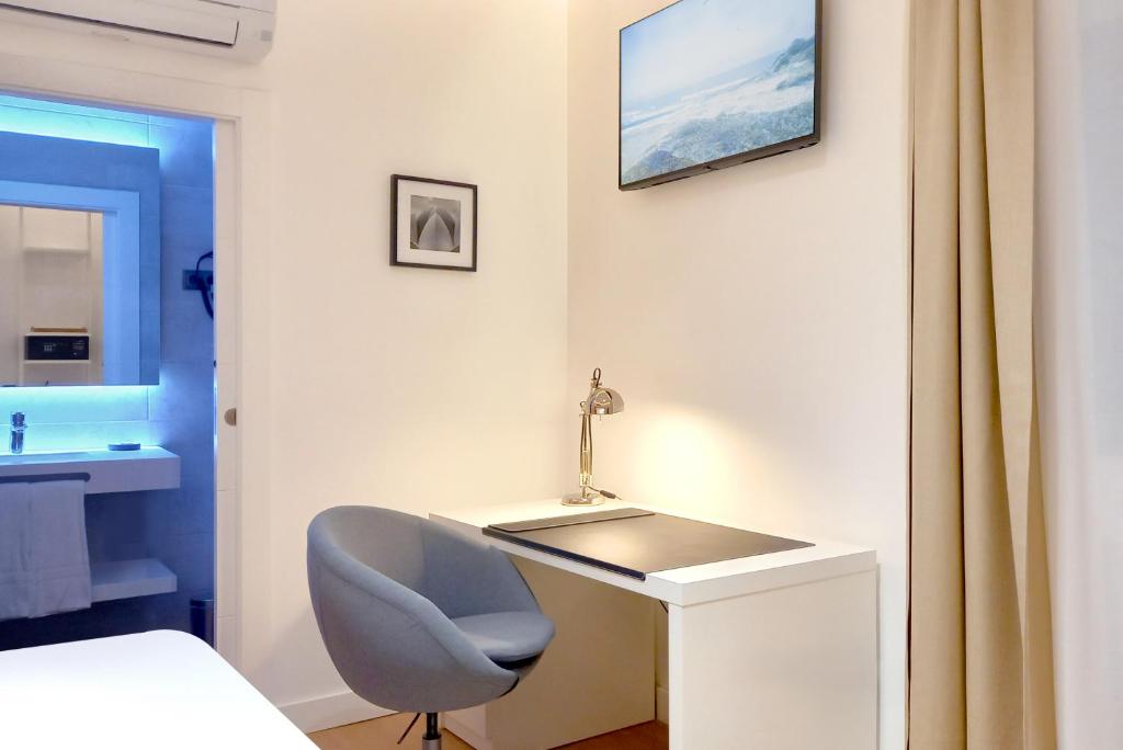 TV a/nebo společenská místnost v ubytování Woohoo Rooms Boutique Gran Vía