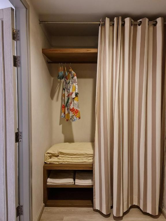 Postel nebo postele na pokoji v ubytování Chelona Beachfront Huahin