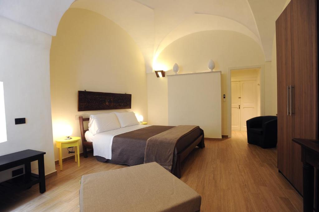 Postel nebo postele na pokoji v ubytování Negramaro Suite B&B