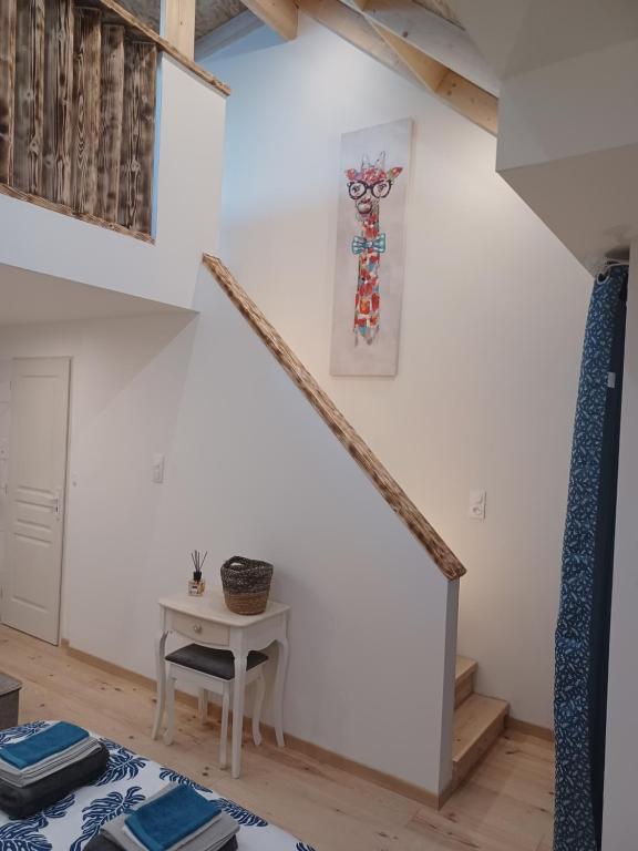 Postel nebo postele na pokoji v ubytování Chambre d'Emma