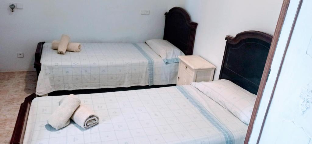 Postel nebo postele na pokoji v ubytování ca sa tia