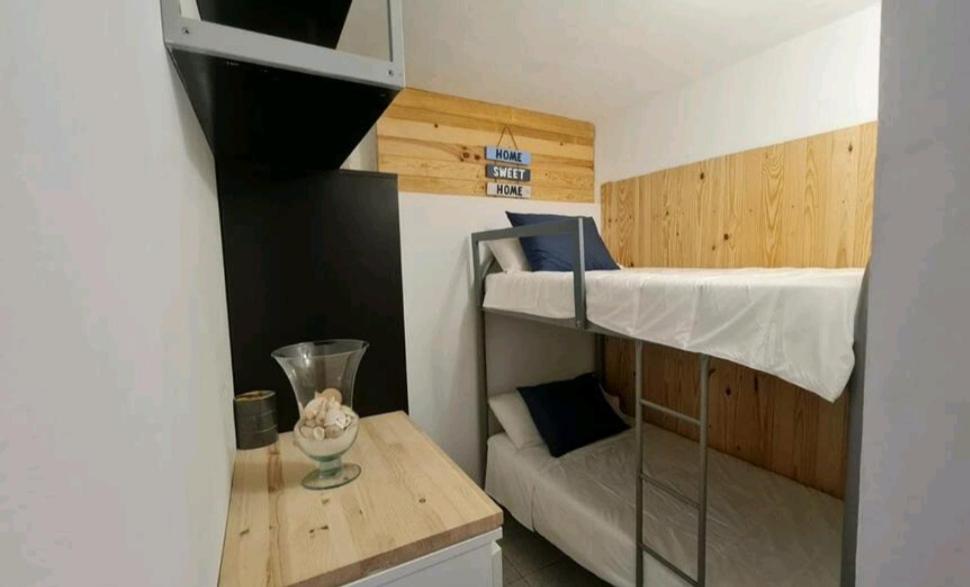 Łóżko lub łóżka w pokoju w obiekcie GRAN CANARIA Oasis La Guancha